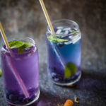 Butterfly Pea Tea Recipe served in two tall glasses.