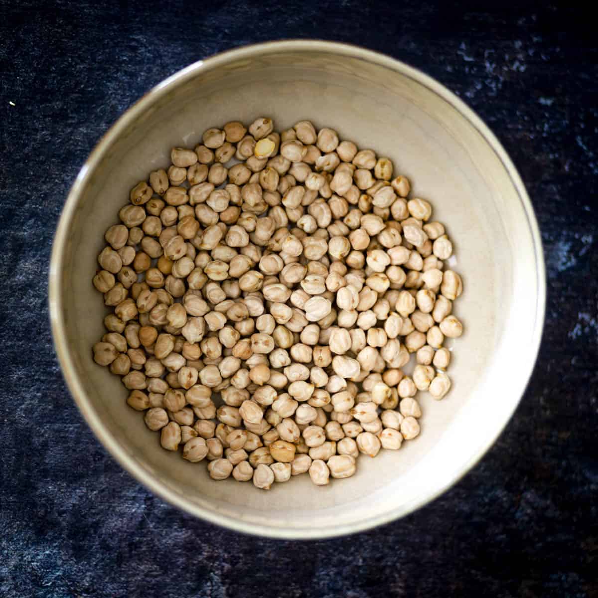 Place dry chickpeas and cover in water. 