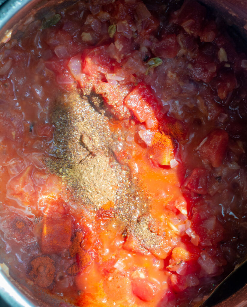 add spices (garam masala, red chili powder) to the instant pot.