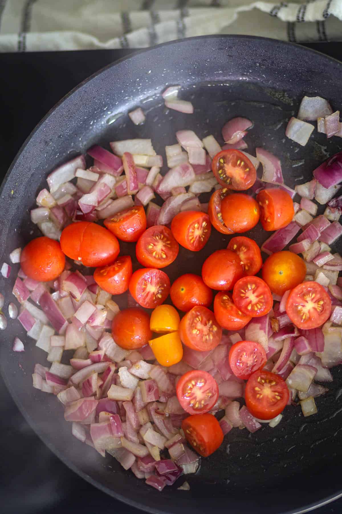 Add cherry tomatoes and cook for 2-3 minutes.