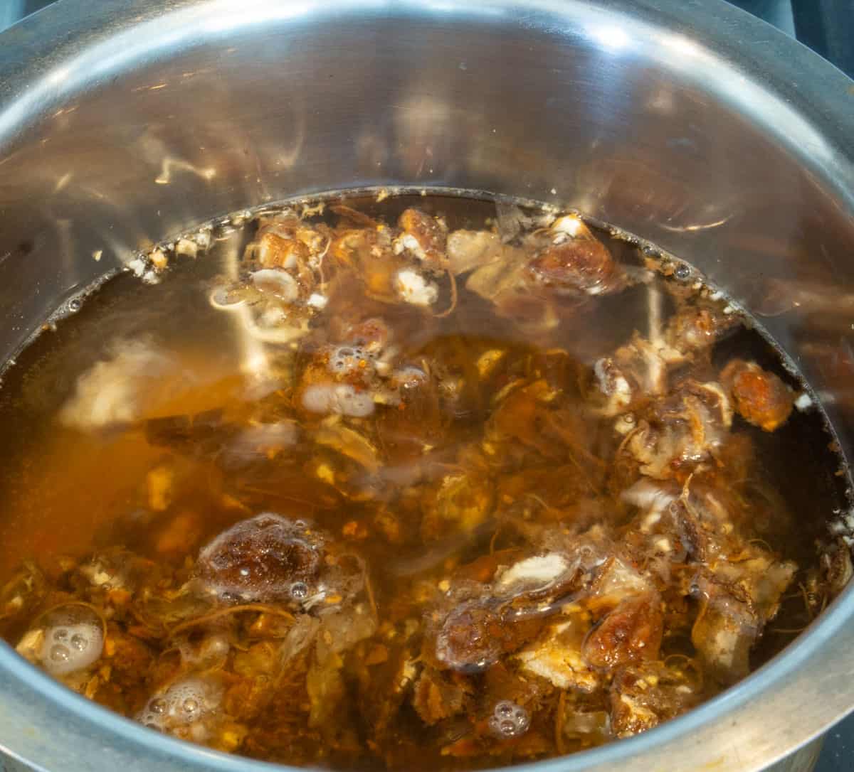 soak tamarind in boiling water.