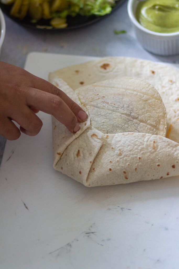 fold the edges toward the mini tortilla