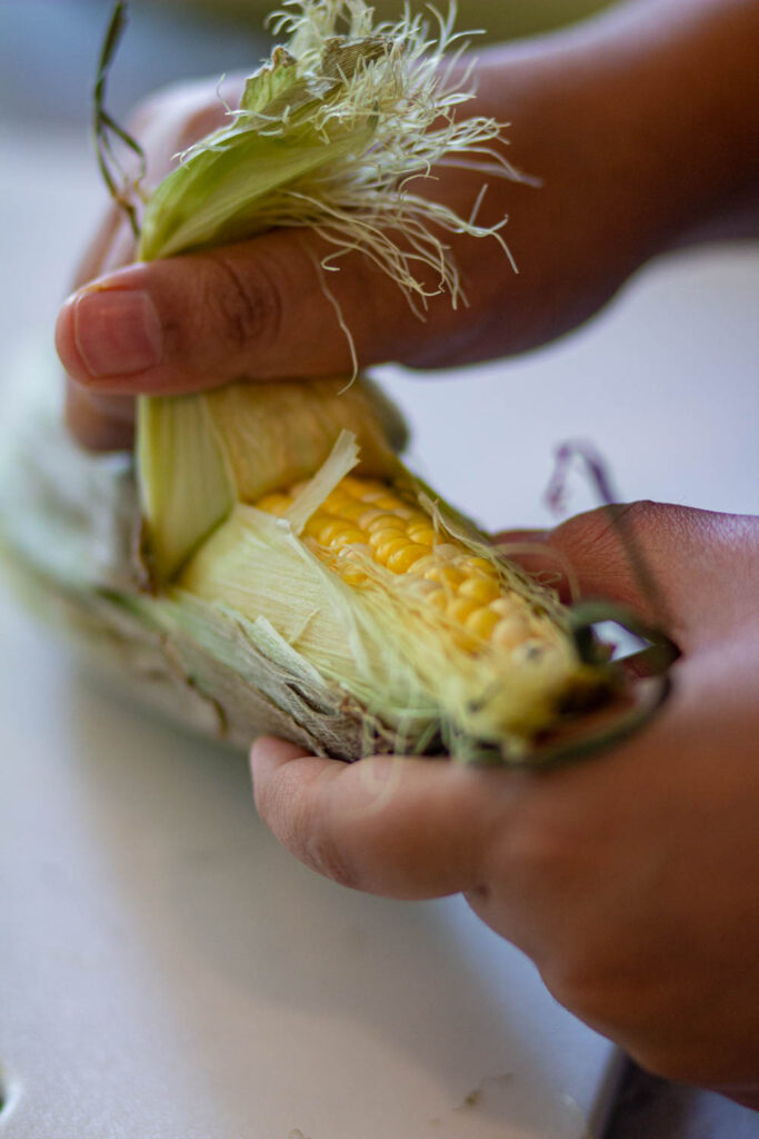 remove the husk of the corns
