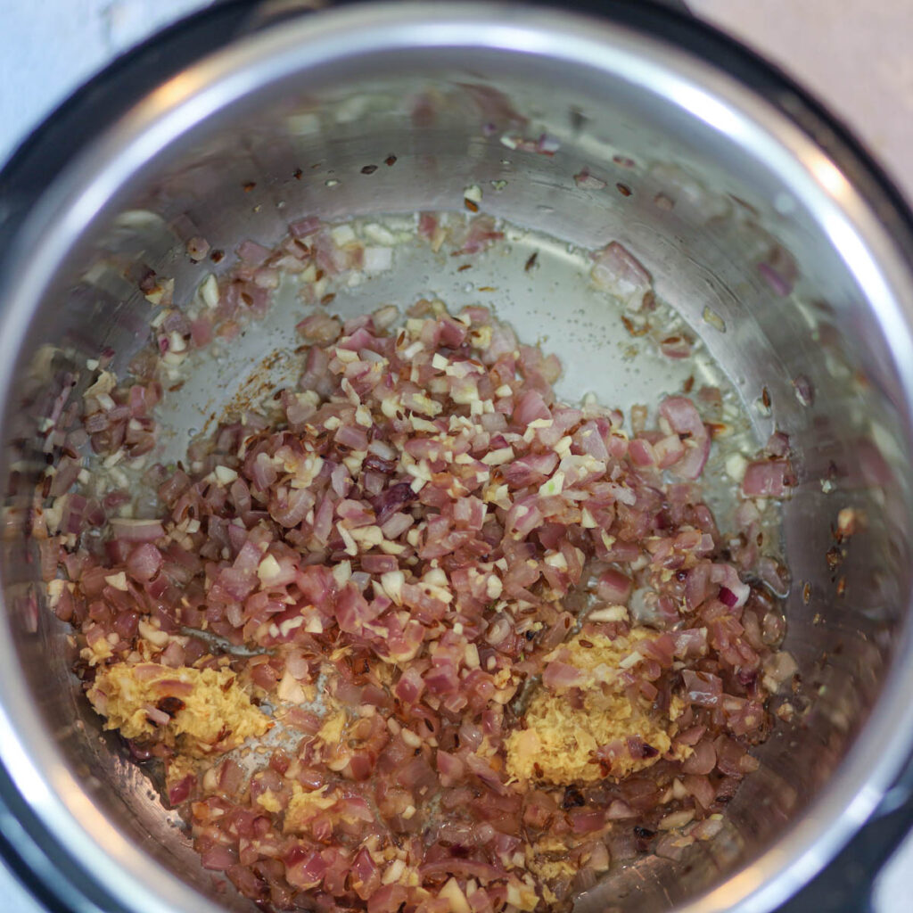 Once onion is cooked add ginger-garlic paste