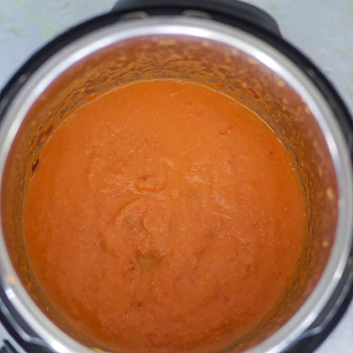 Blend onion and tomatoes until smooth.