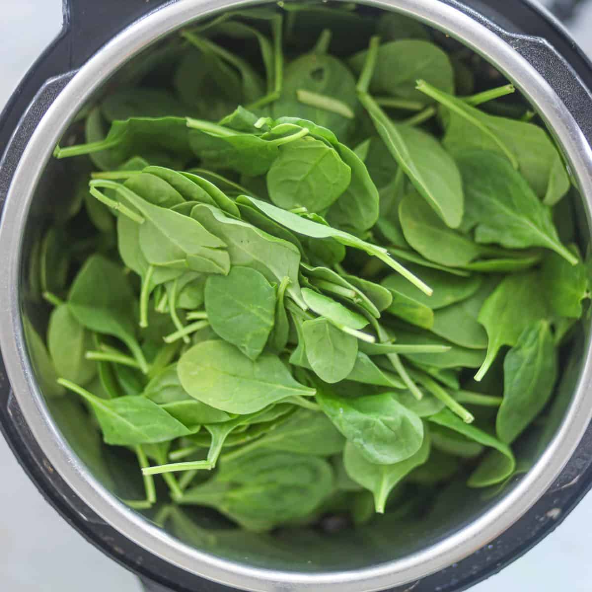 Add spinach, once the masala is cooked.