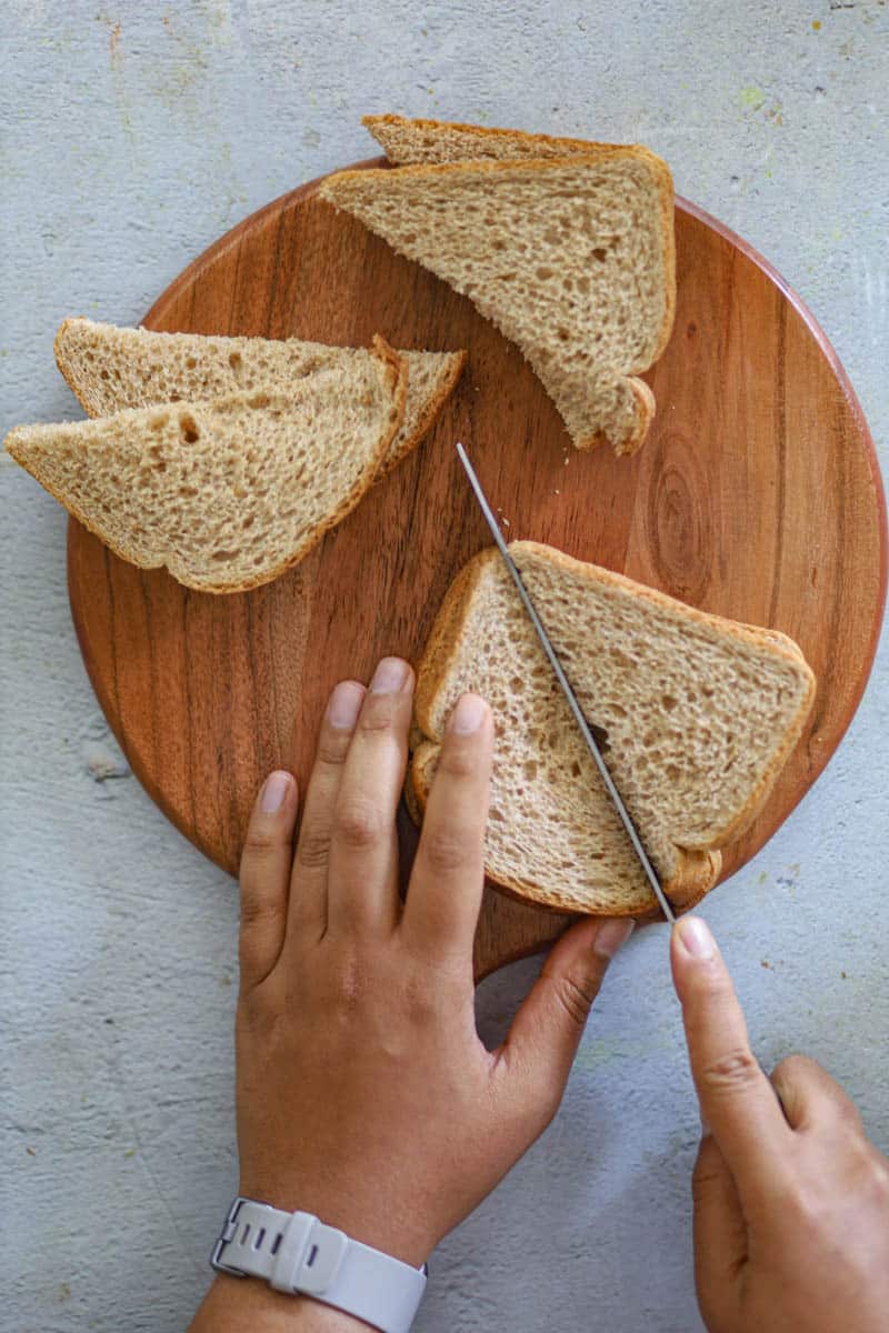 Cut the bread in squares or triangles.
