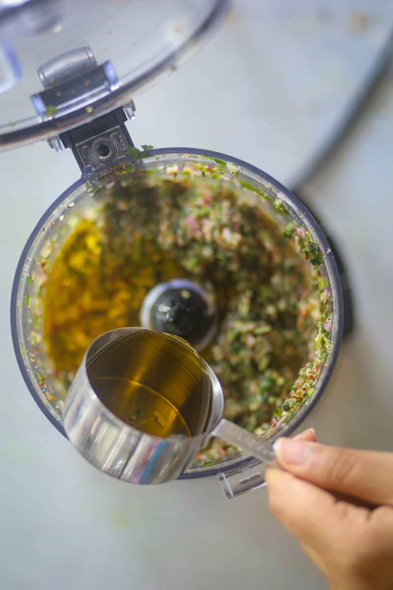 Stir in olive oil, red wine vinegar, salt & pepper, and dried oregano.