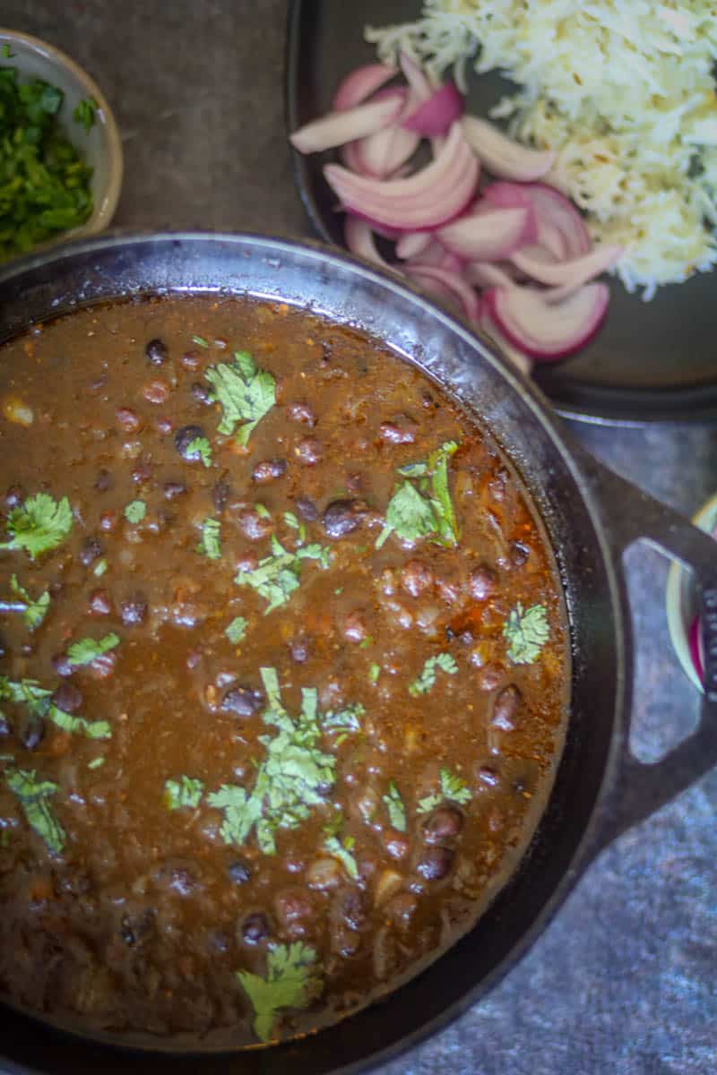 Chana curry garnished with cilantro.