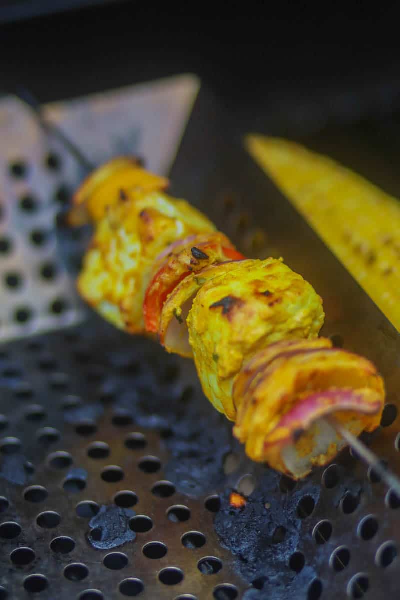 Once grilled, paneer tikka will have nice charred flavor.