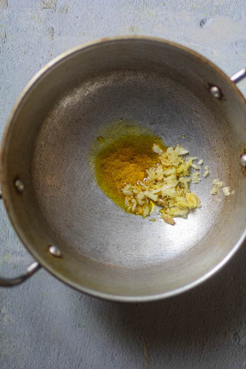 Add oil in the skillet and saute ginger-garlic paste.