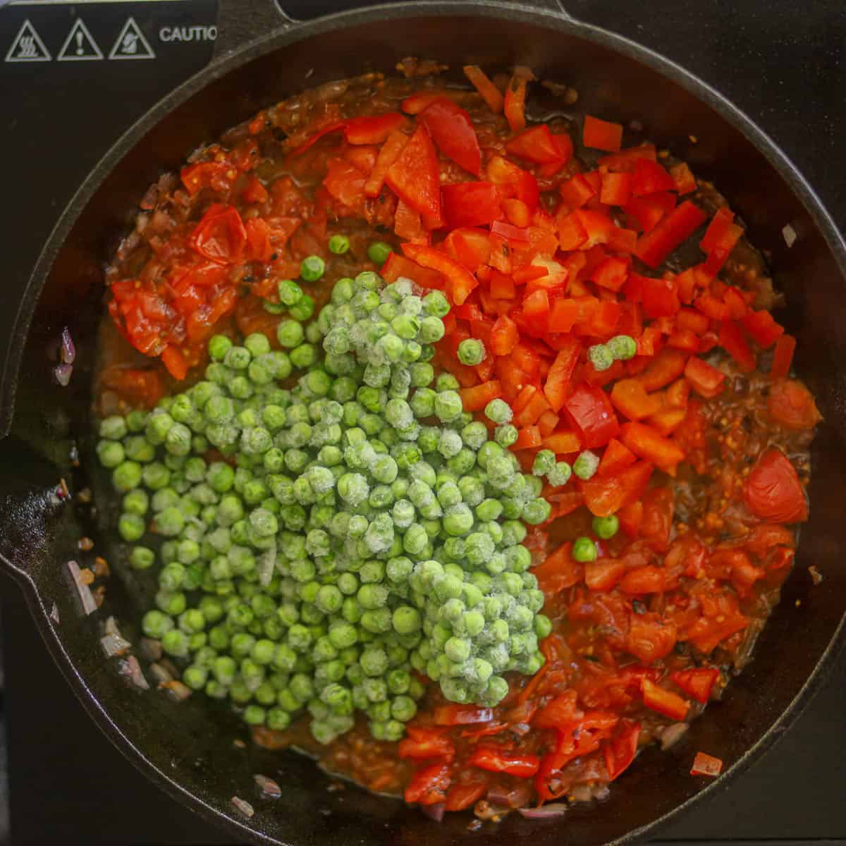 Add peas and bell peppers and saute for 1-2 minutes.